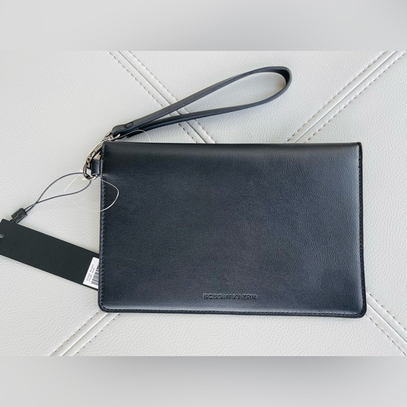 New With Tags
BCBG Pearl + Leather Inspired
Envelope Clutch in
BLACK - Picture 7 of 15